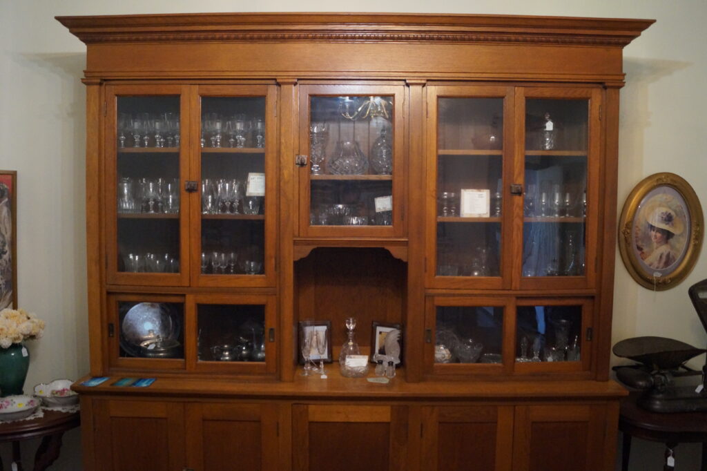 Antique wooden display cabinet at The Octagon House